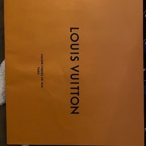 Authentic Louis Vuitton shopping bag and box with ribbon